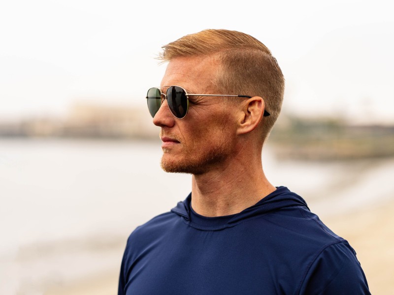 Man wearing polarized aviator sunglasses