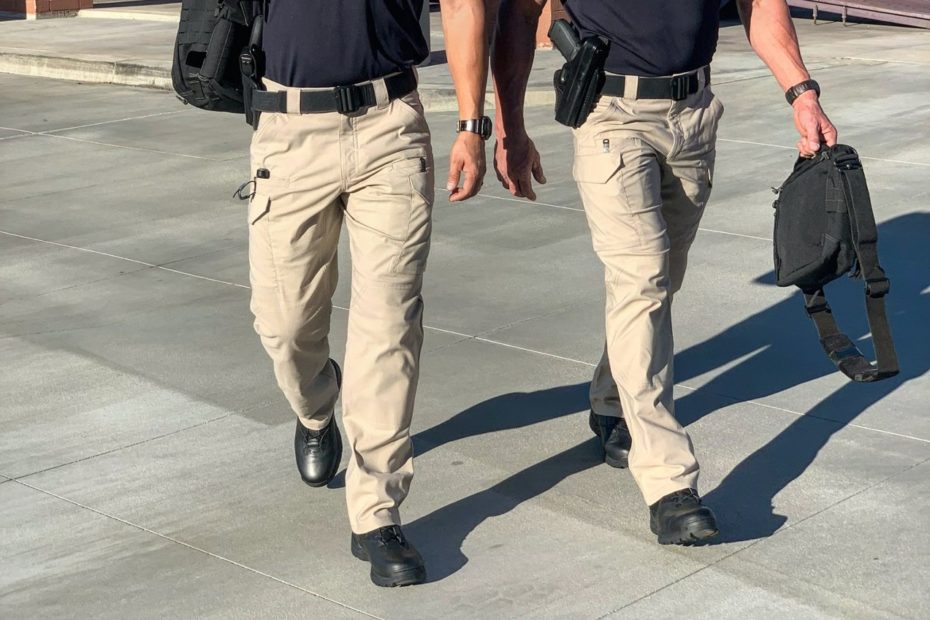 Police officers wearing tactical pants