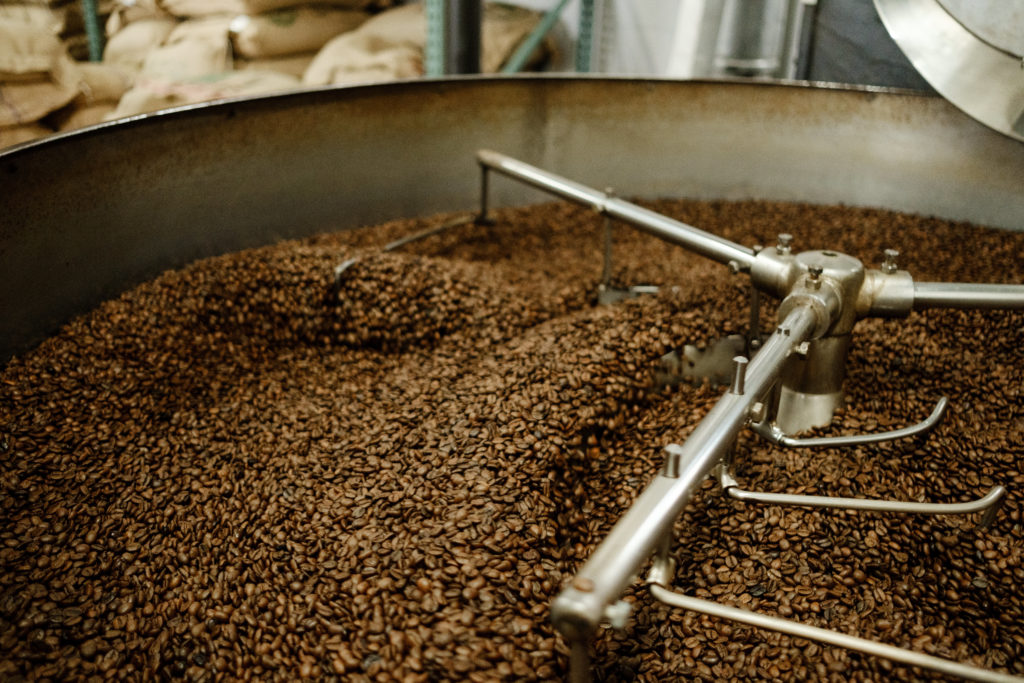 Coffee beans in an industrial roaster.